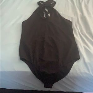 Black cross front body suit with peephole